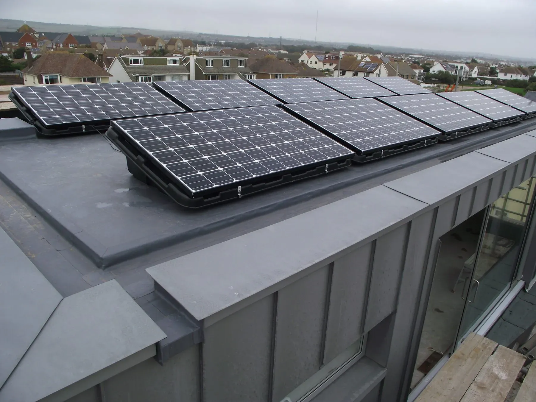Solar PV panels installed on a pitched roof in Sussex